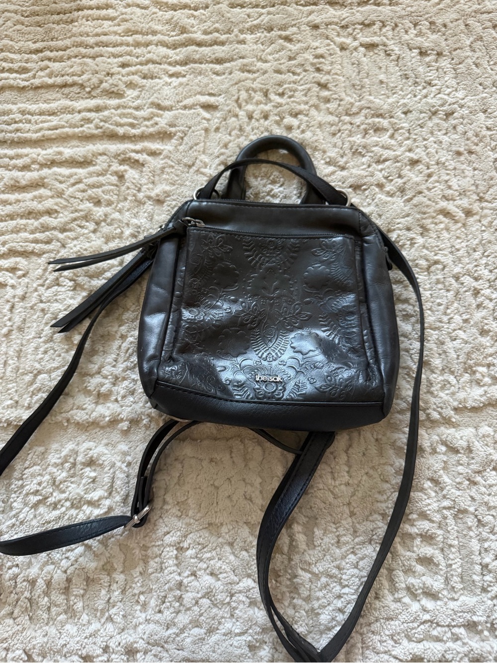 The Sak Black Embossed Leather Convertible Backpack